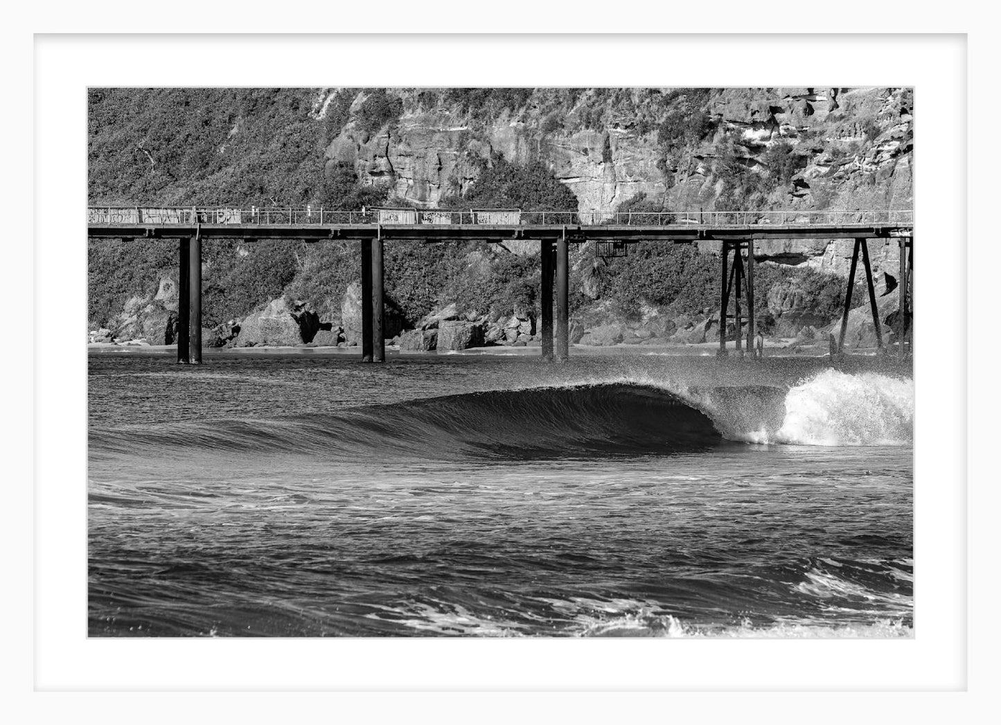 White tee with small orange logo.