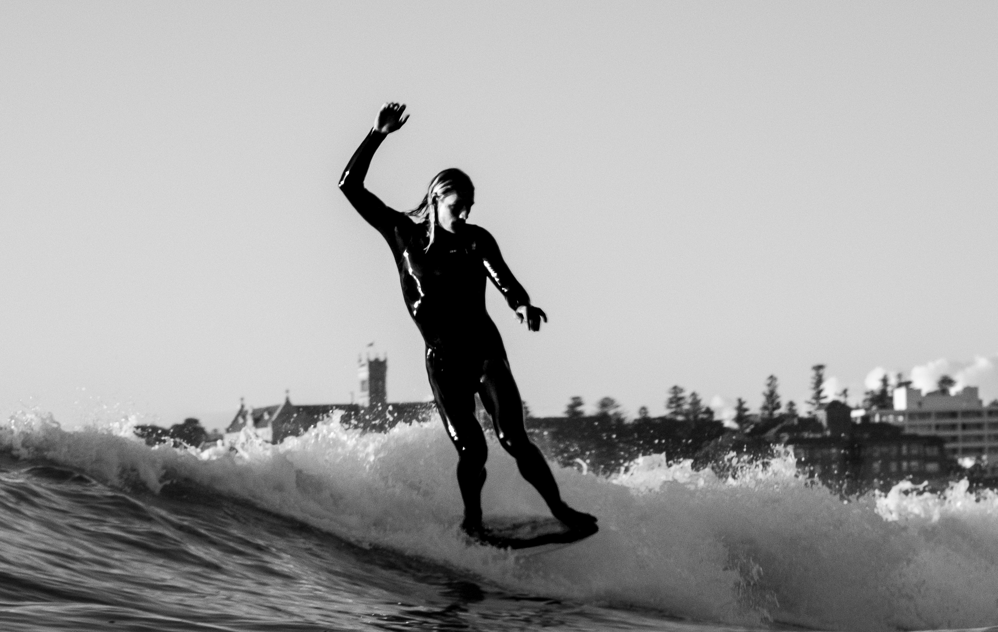 Manly Beach surfers and waves