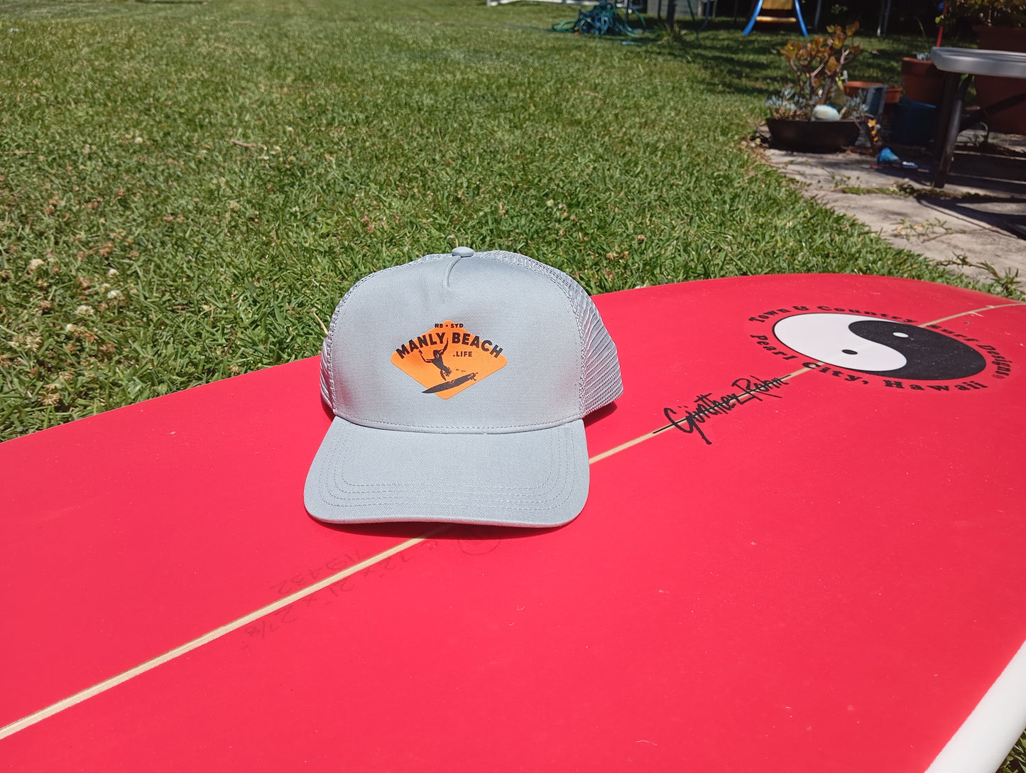 Back mesh of grey trucker cap.”